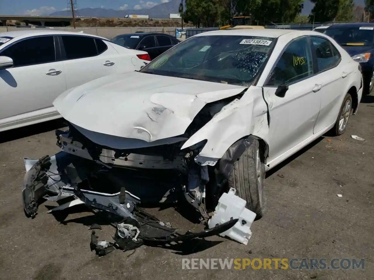 2 Photograph of a damaged car 4T1C11AK4MU468839 TOYOTA CAMRY 2021