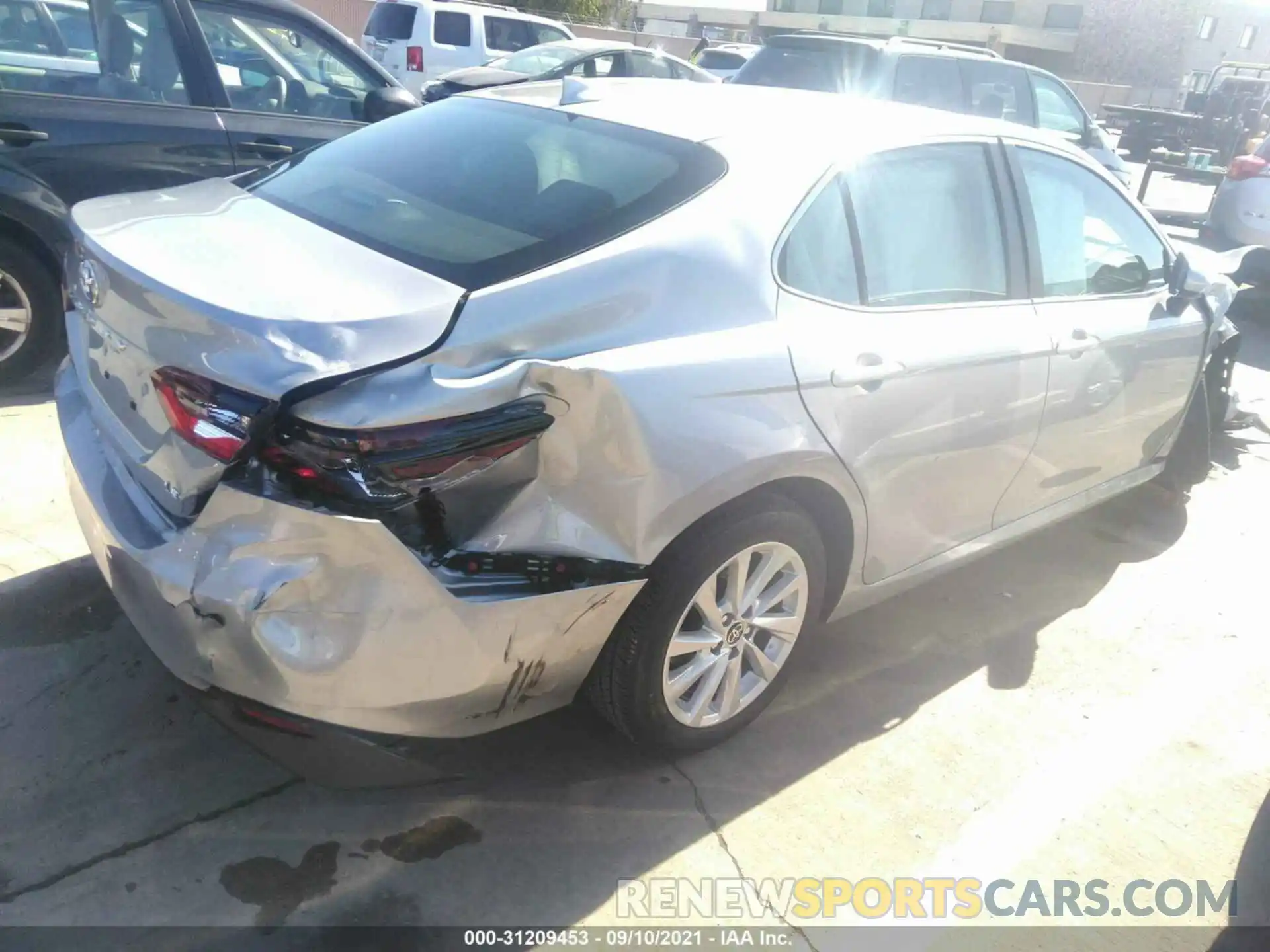 4 Photograph of a damaged car 4T1C11AK6MU469216 TOYOTA CAMRY 2021