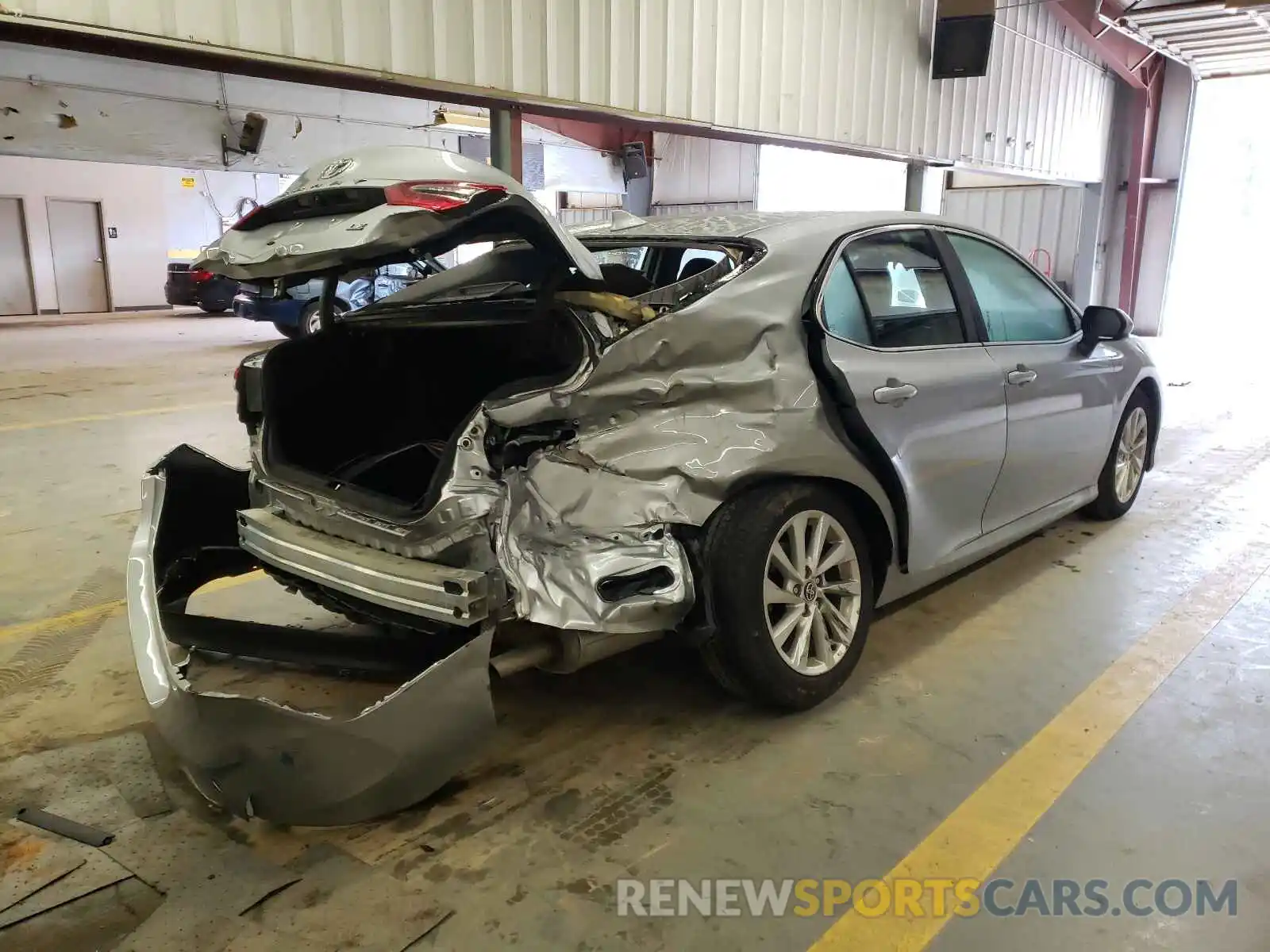 4 Photograph of a damaged car 4T1C11AK6MU557201 TOYOTA CAMRY 2021