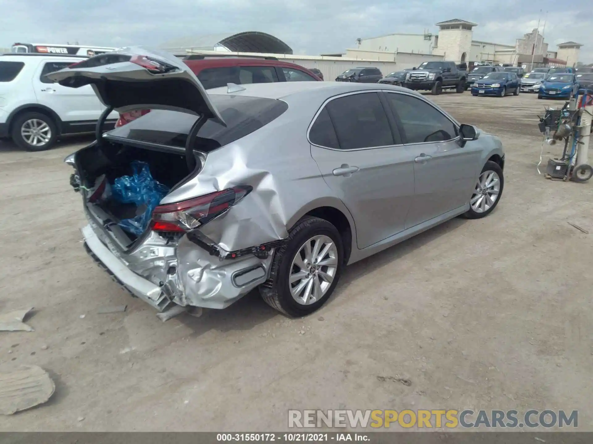 4 Photograph of a damaged car 4T1C11AK9MU467797 TOYOTA CAMRY 2021