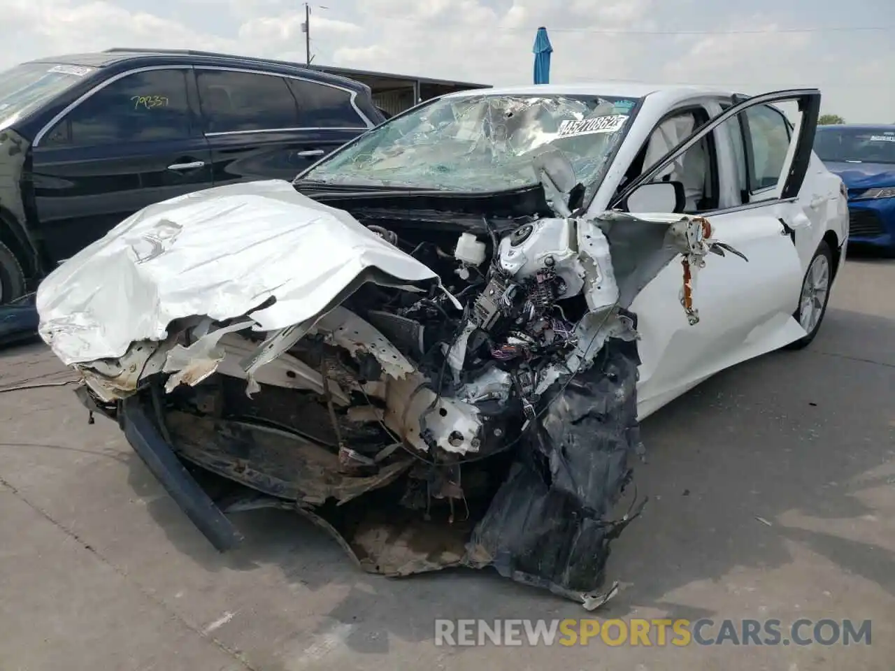 2 Photograph of a damaged car 4T1C11AK9MU574669 TOYOTA CAMRY 2021