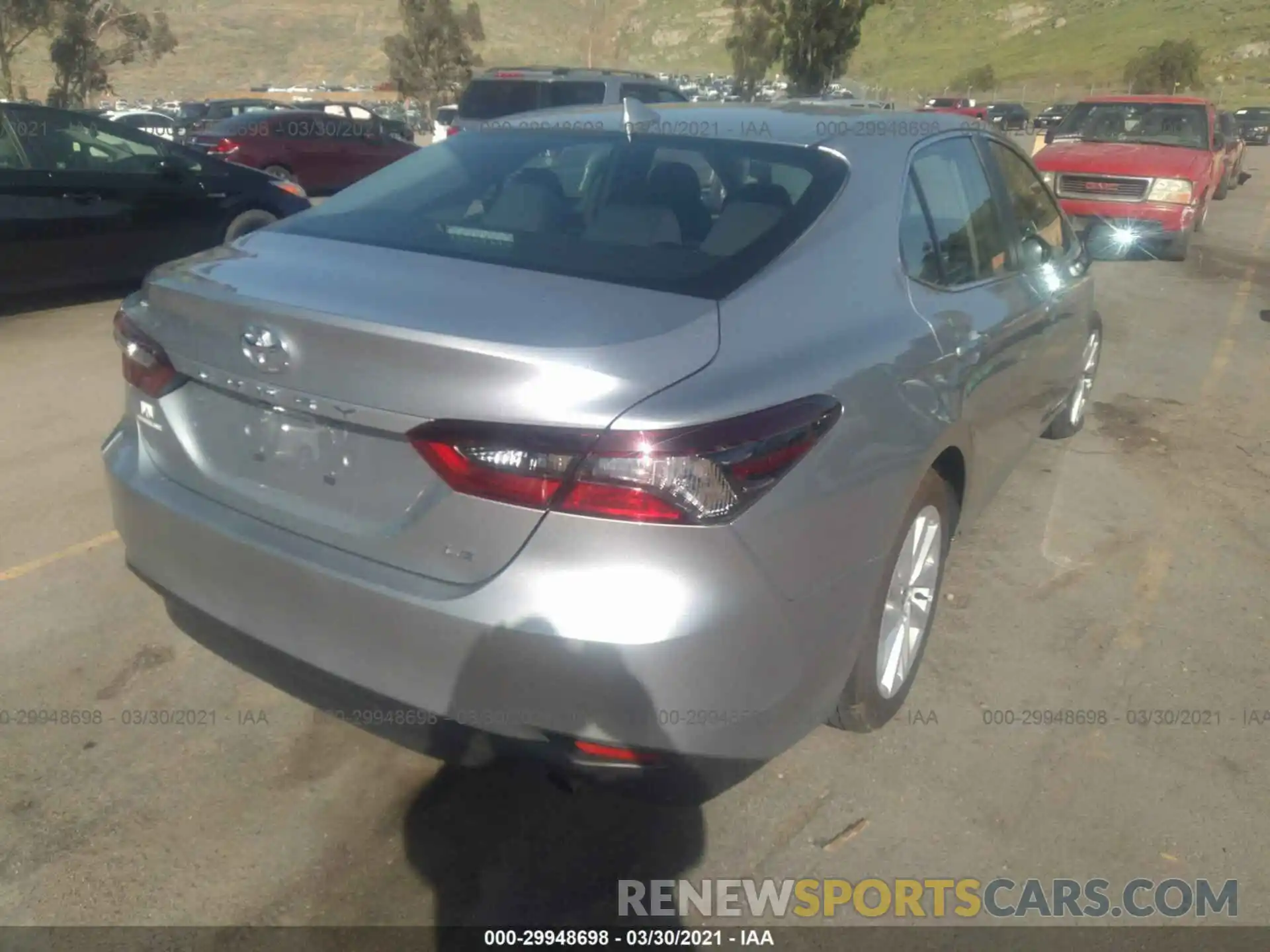 4 Photograph of a damaged car 4T1C11AKXMU549747 TOYOTA CAMRY 2021