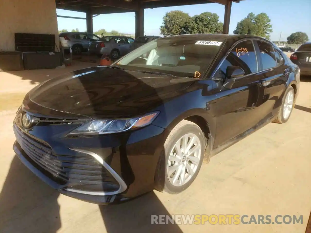 2 Photograph of a damaged car 4T1C11AKXMU552213 TOYOTA CAMRY 2021