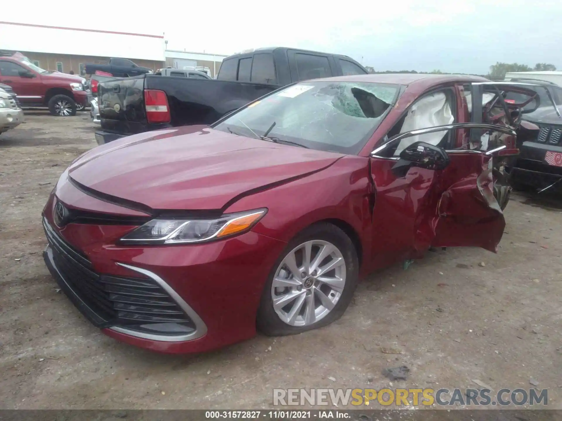 2 Photograph of a damaged car 4T1C11AKXMU566886 TOYOTA CAMRY 2021