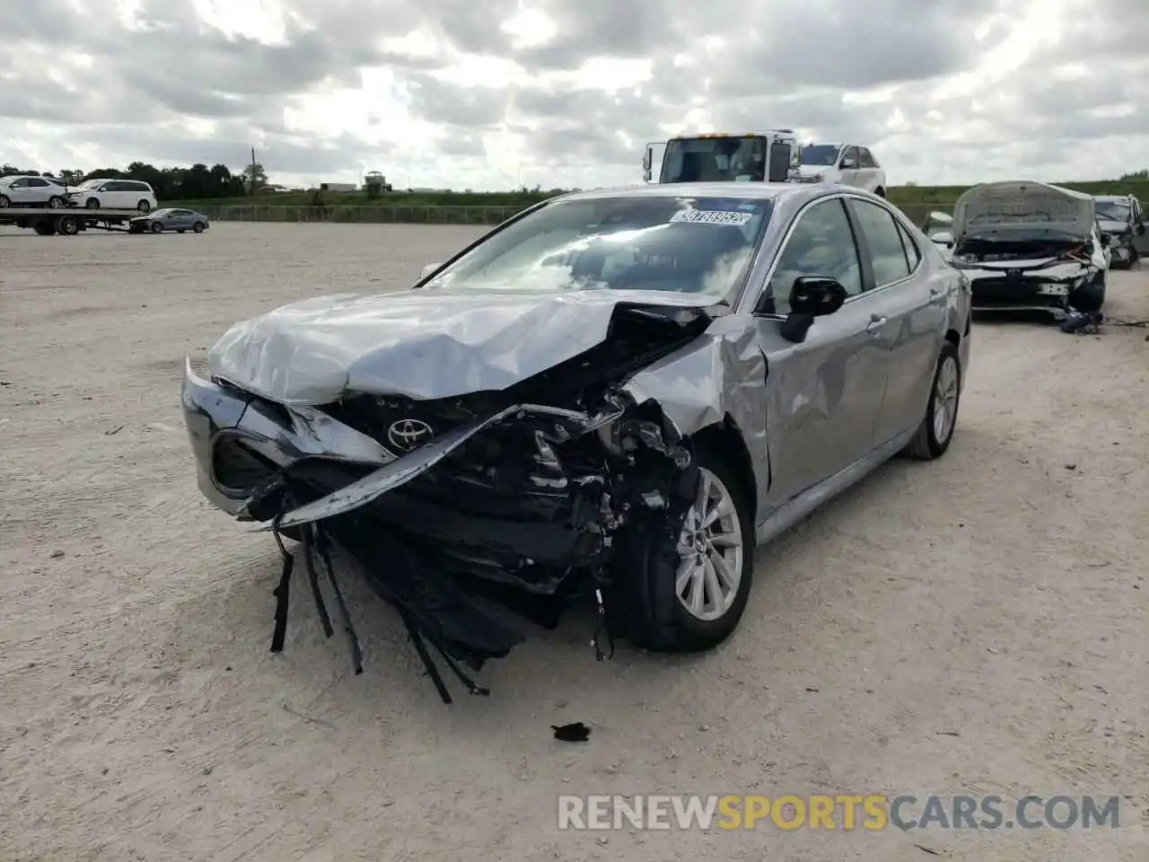 2 Photograph of a damaged car 4T1C11AKXMU576835 TOYOTA CAMRY 2021