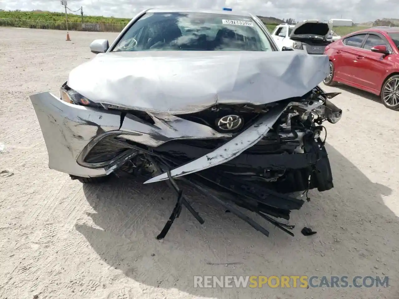 9 Photograph of a damaged car 4T1C11AKXMU576835 TOYOTA CAMRY 2021