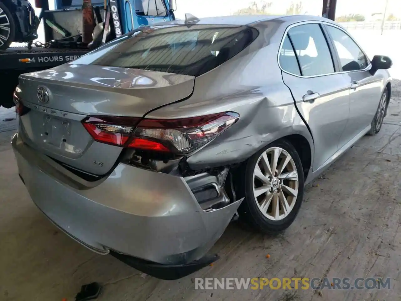 4 Photograph of a damaged car 4T1C11AKXMU582392 TOYOTA CAMRY 2021