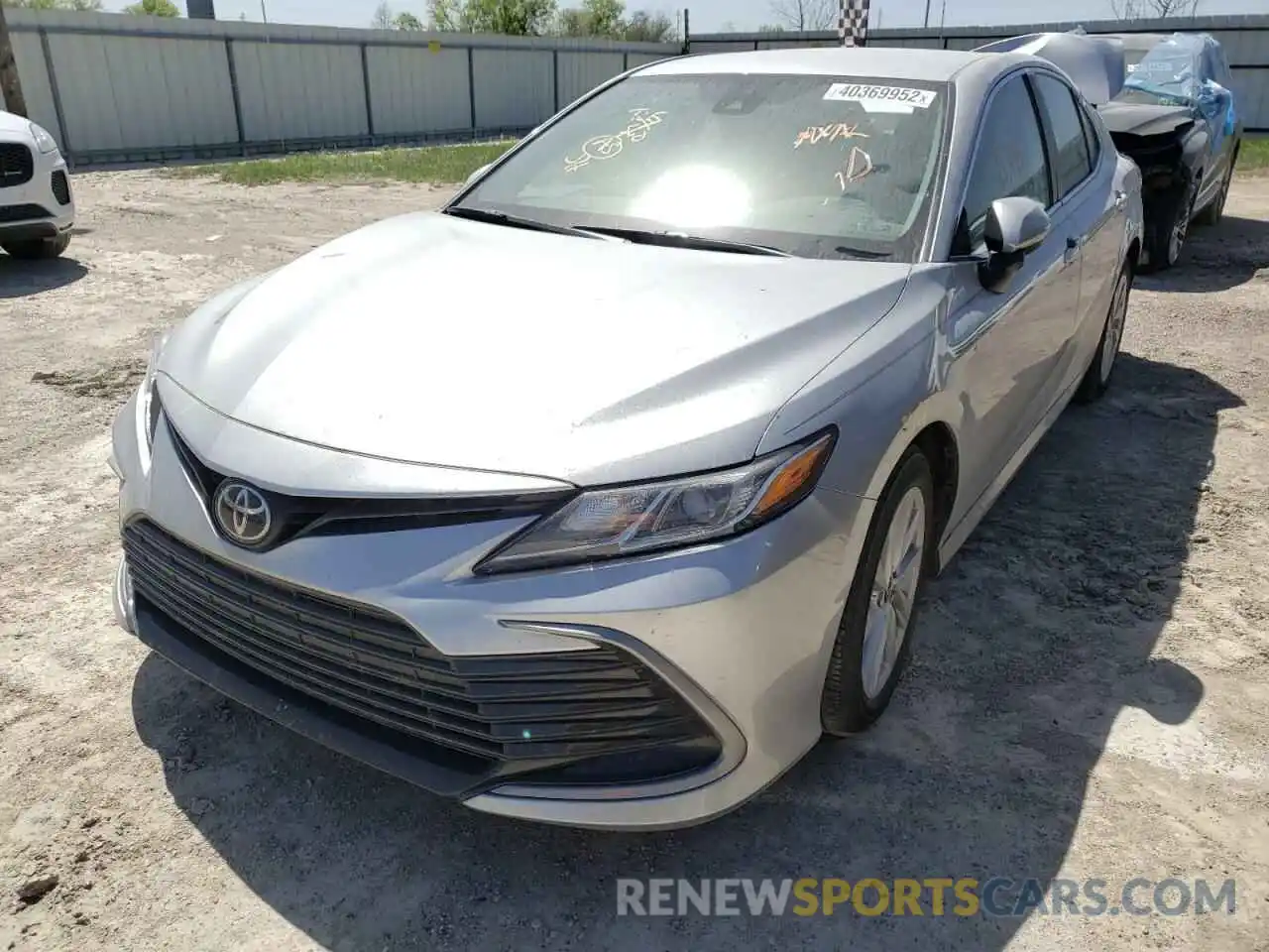 2 Photograph of a damaged car 4T1C11AKXMU597118 TOYOTA CAMRY 2021