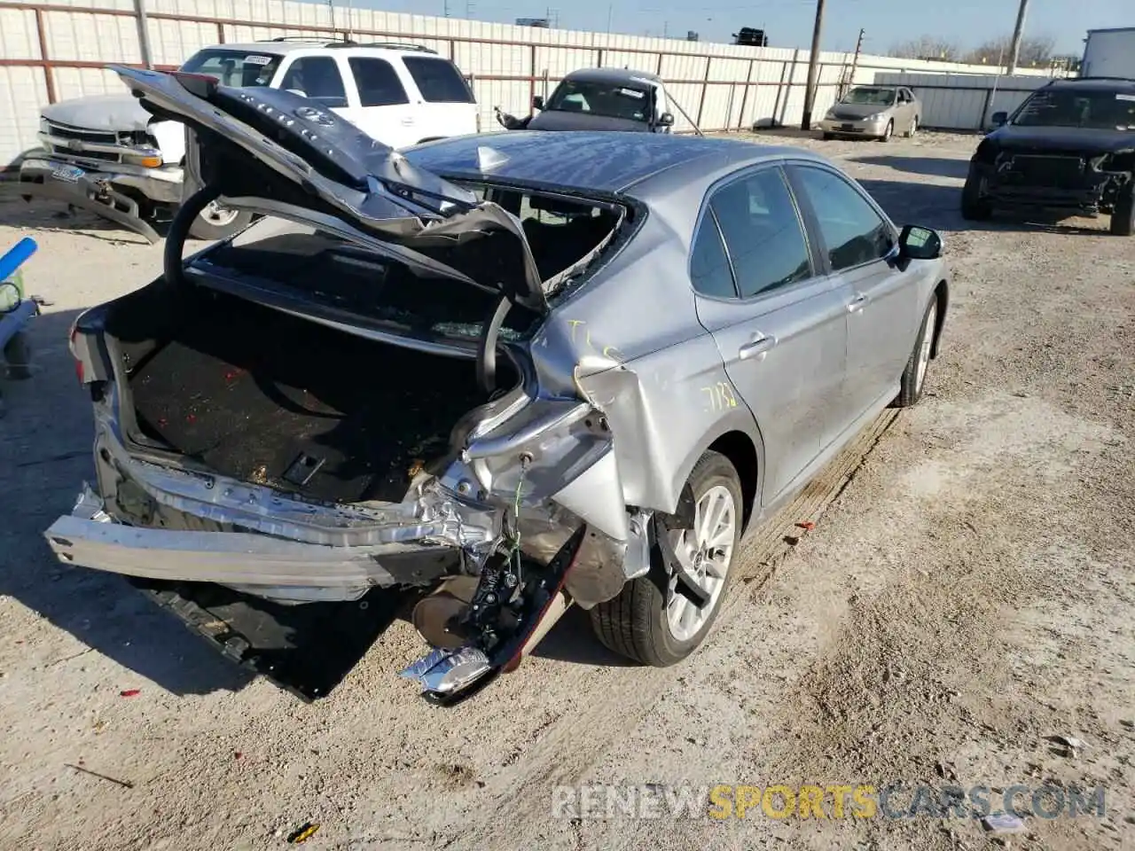 4 Photograph of a damaged car 4T1C11AKXMU597118 TOYOTA CAMRY 2021