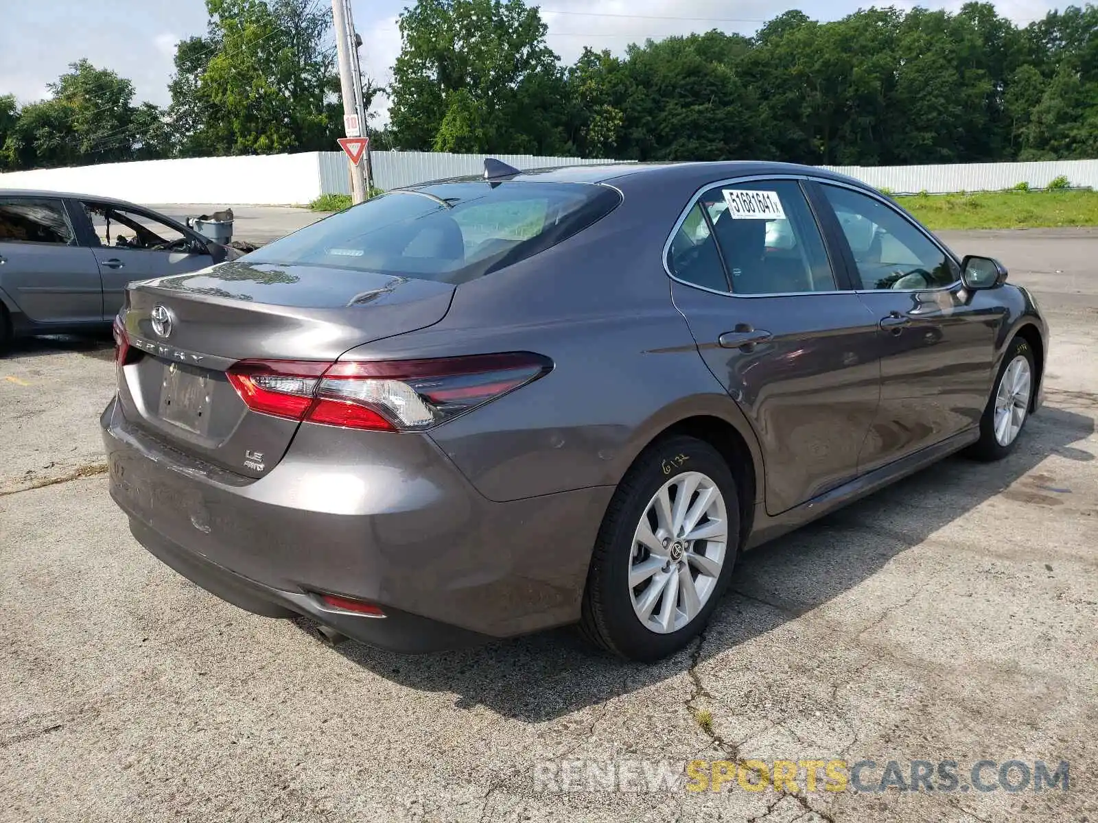 4 Photograph of a damaged car 4T1C11BK5MU025632 TOYOTA CAMRY 2021