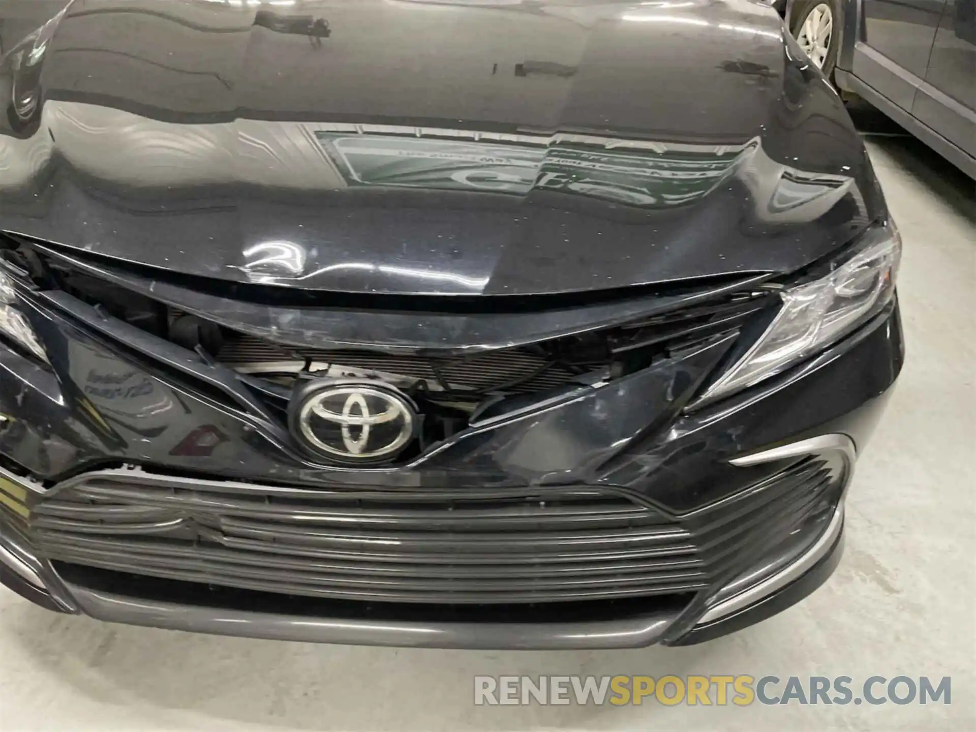 32 Photograph of a damaged car 4T1C11BKXMU038733 TOYOTA CAMRY 2021