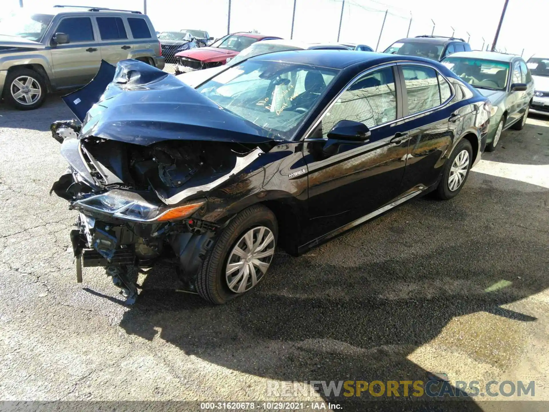 2 Photograph of a damaged car 4T1C31AK5MU569902 TOYOTA CAMRY 2021