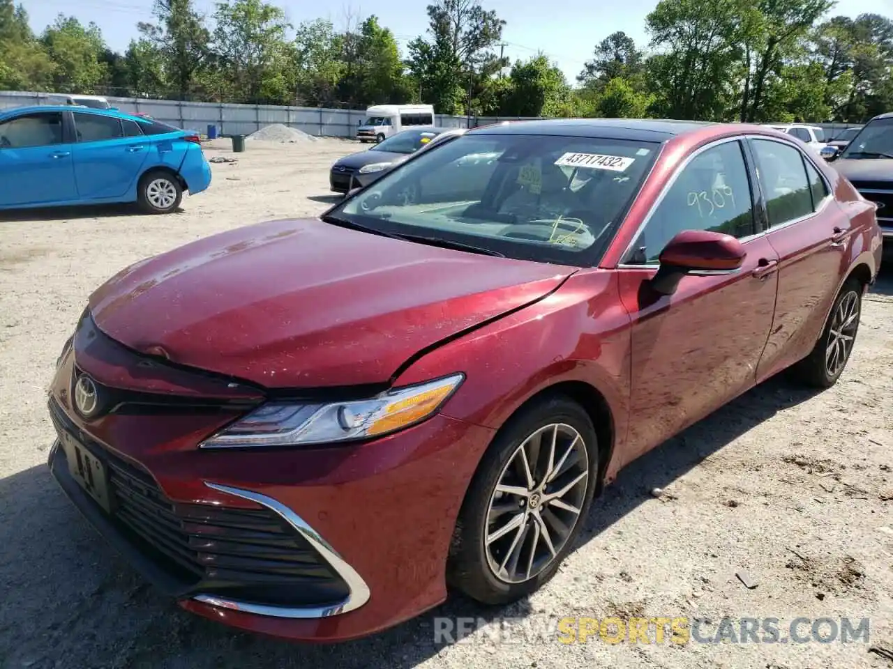 2 Photograph of a damaged car 4T1F11BK0MU023784 TOYOTA CAMRY 2021