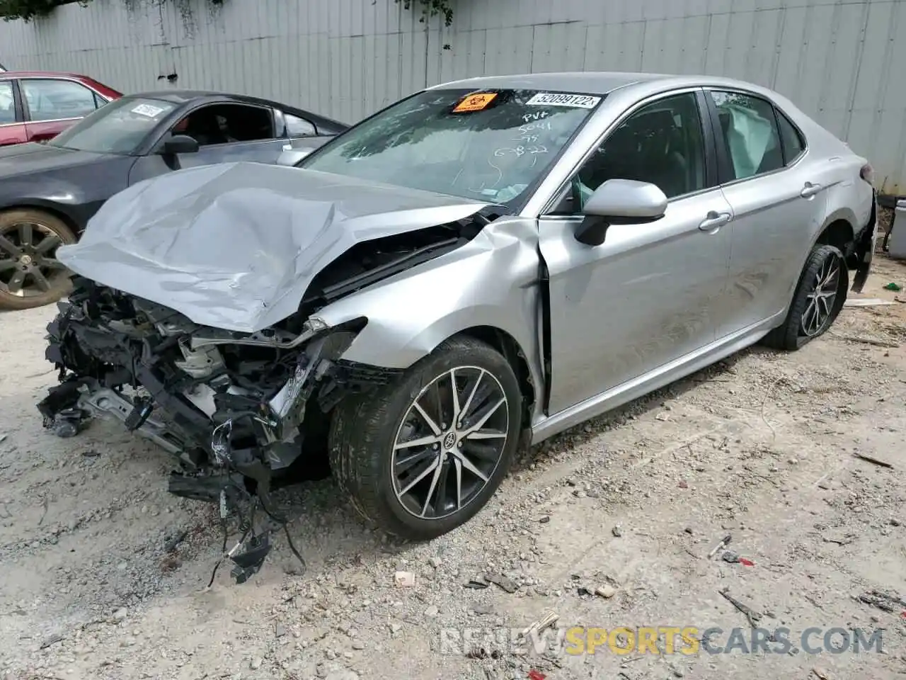 2 Photograph of a damaged car 4T1G11AK0MU415041 TOYOTA CAMRY 2021