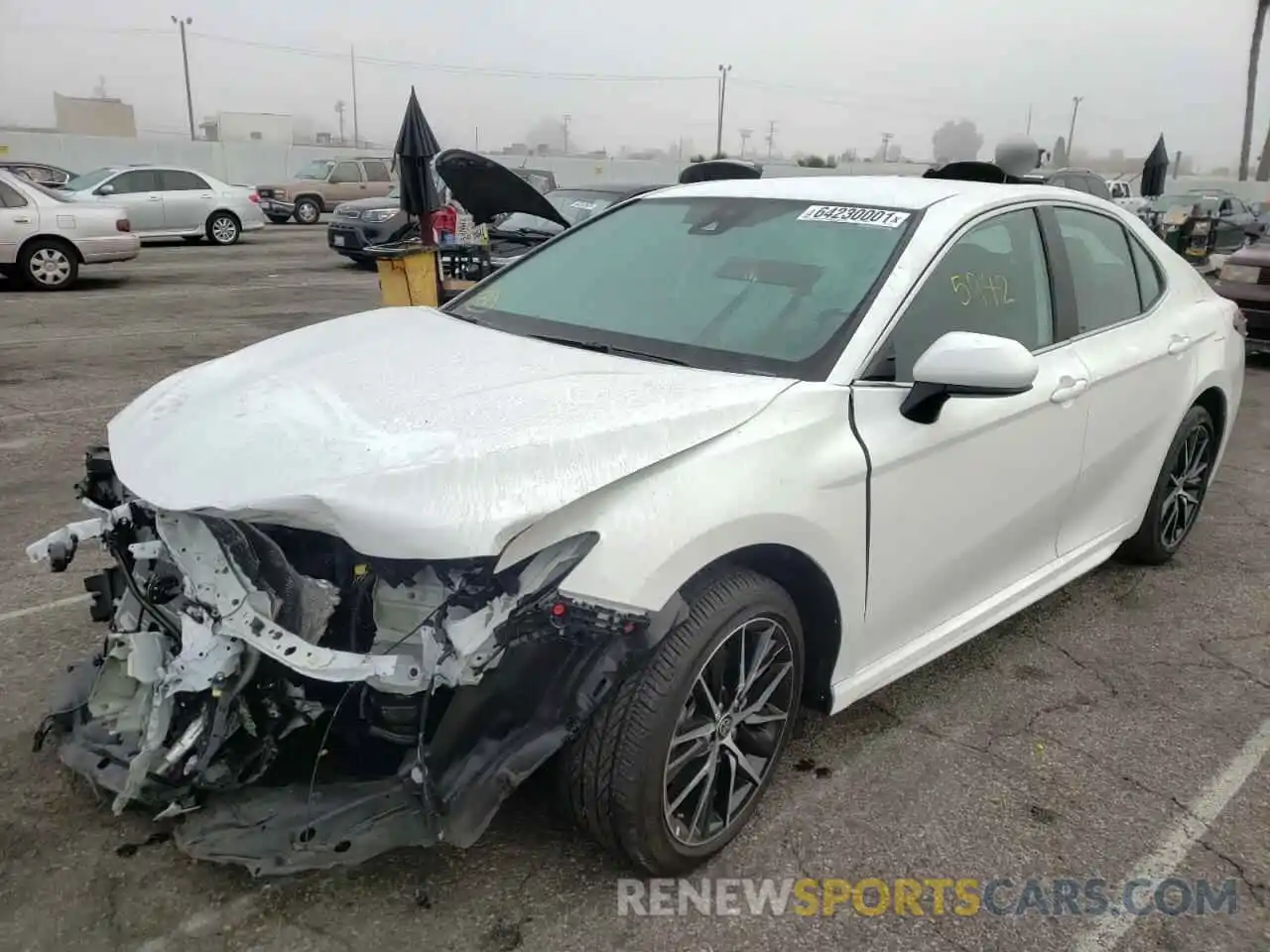 2 Photograph of a damaged car 4T1G11AK0MU433751 TOYOTA CAMRY 2021