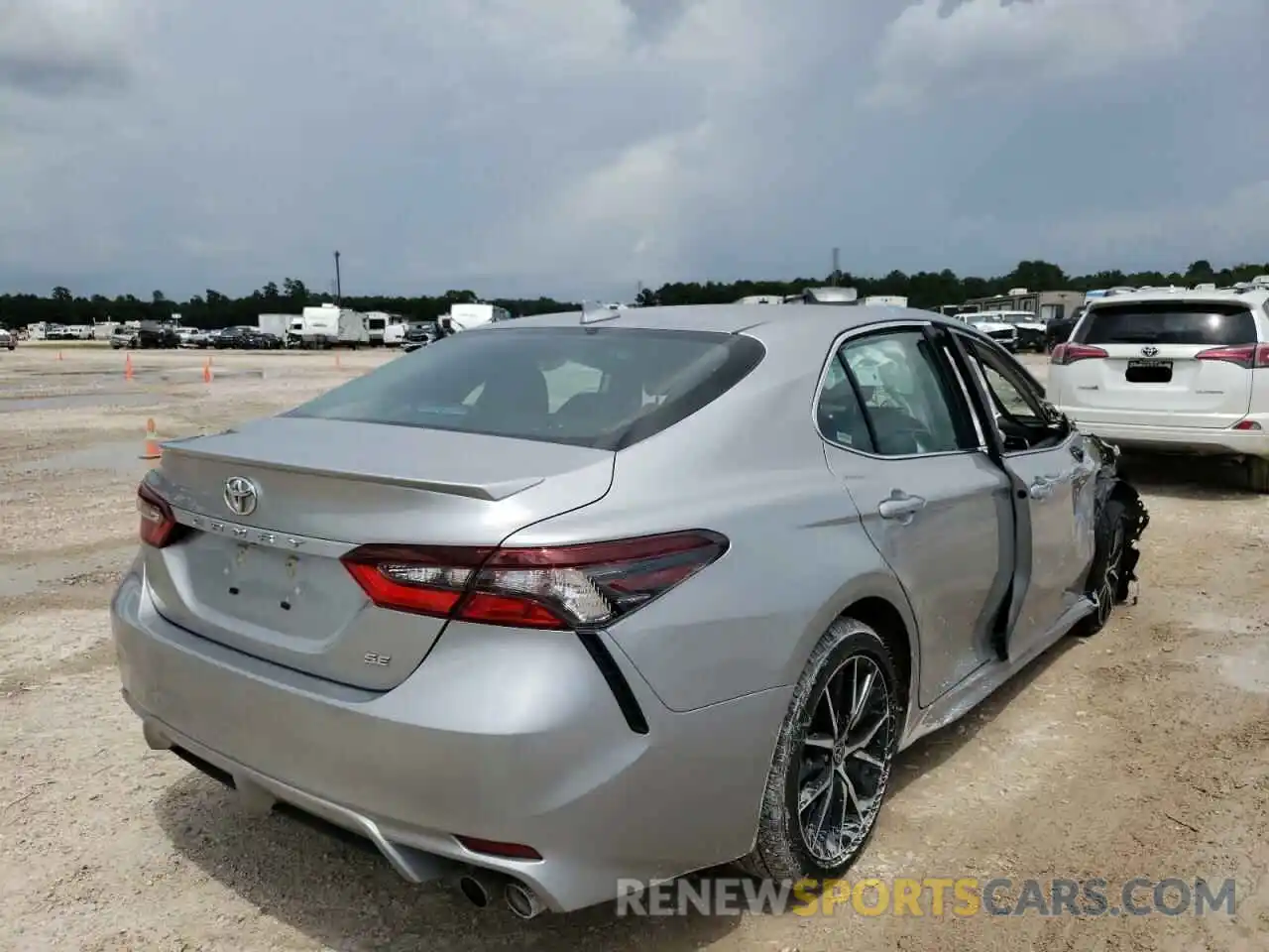 4 Photograph of a damaged car 4T1G11AK0MU457242 TOYOTA CAMRY 2021