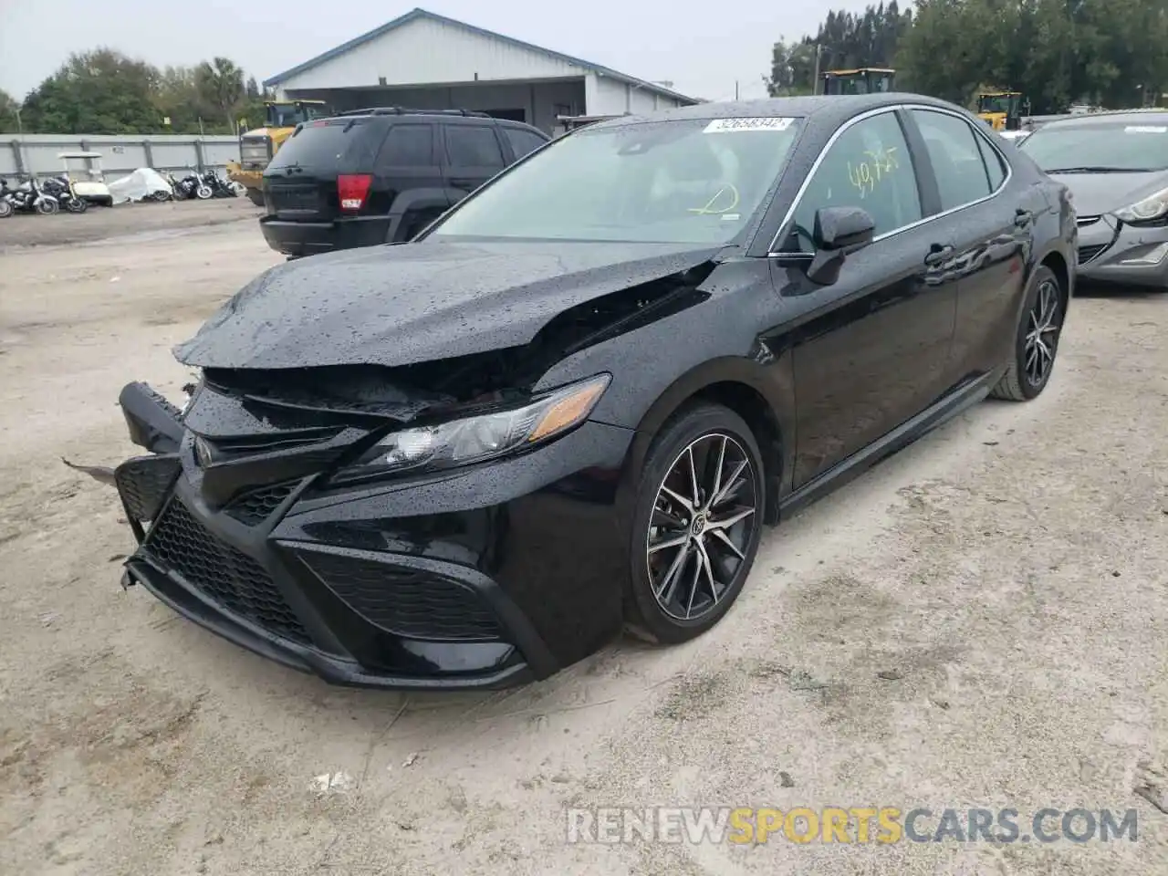 2 Photograph of a damaged car 4T1G11AK0MU459699 TOYOTA CAMRY 2021