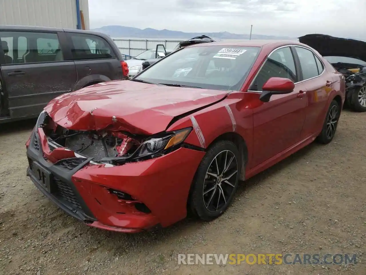 2 Photograph of a damaged car 4T1G11AK0MU463977 TOYOTA CAMRY 2021