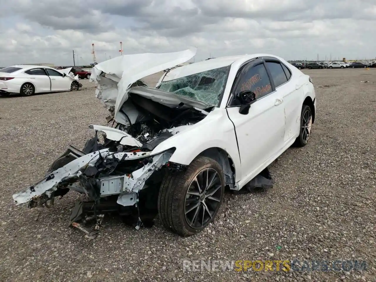 2 Photograph of a damaged car 4T1G11AK0MU476227 TOYOTA CAMRY 2021