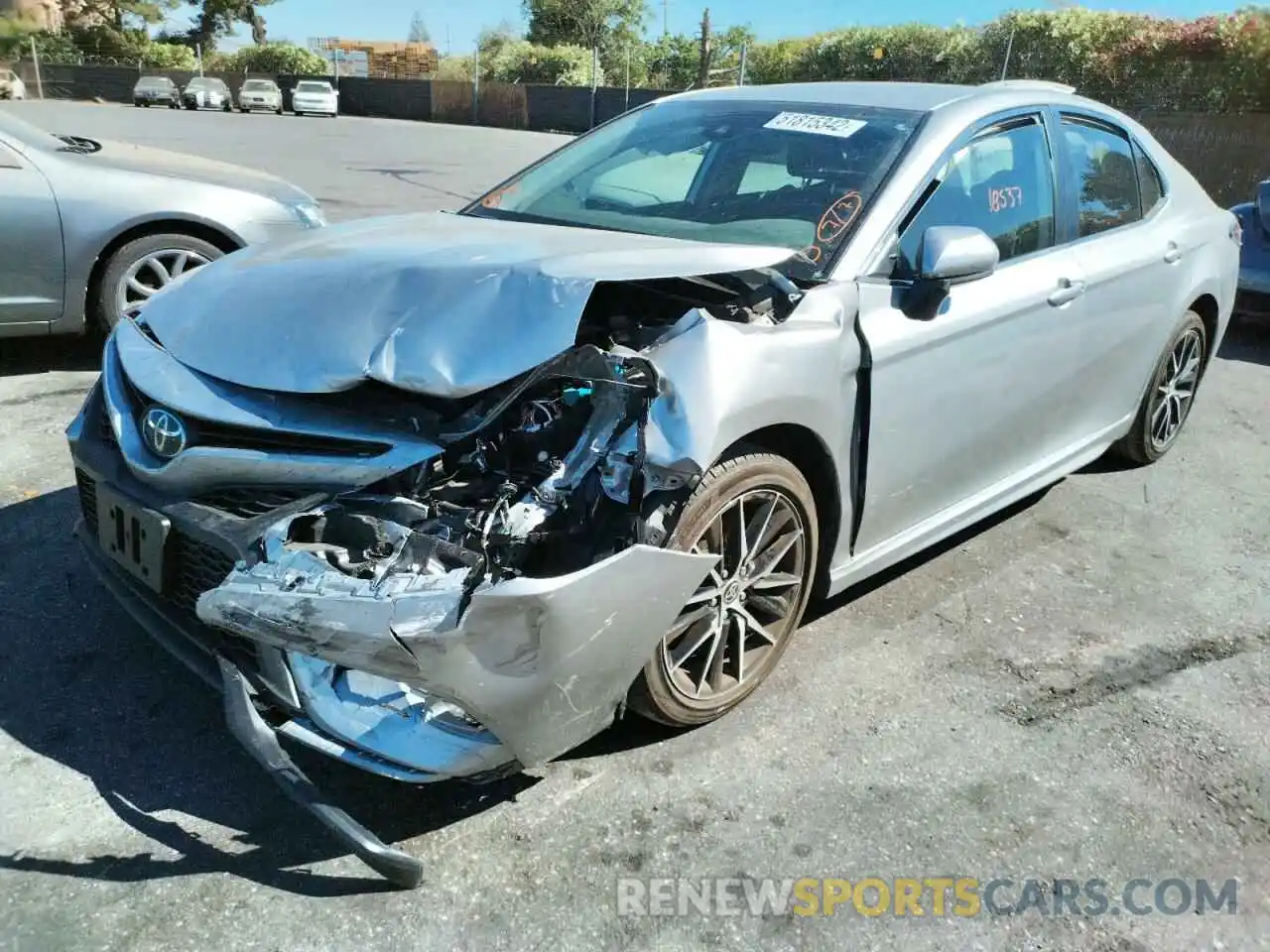 2 Photograph of a damaged car 4T1G11AK0MU483694 TOYOTA CAMRY 2021