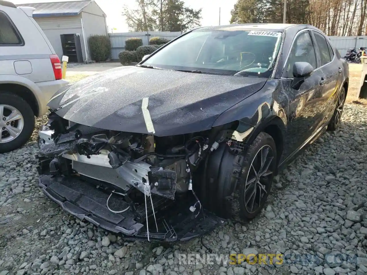 2 Photograph of a damaged car 4T1G11AK0MU494839 TOYOTA CAMRY 2021