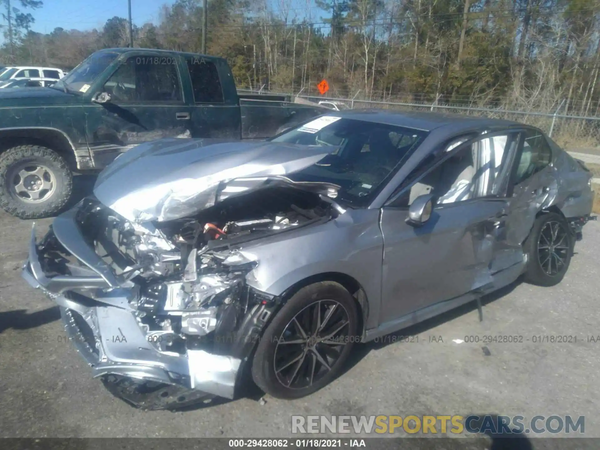 2 Photograph of a damaged car 4T1G11AK0MU521229 TOYOTA CAMRY 2021