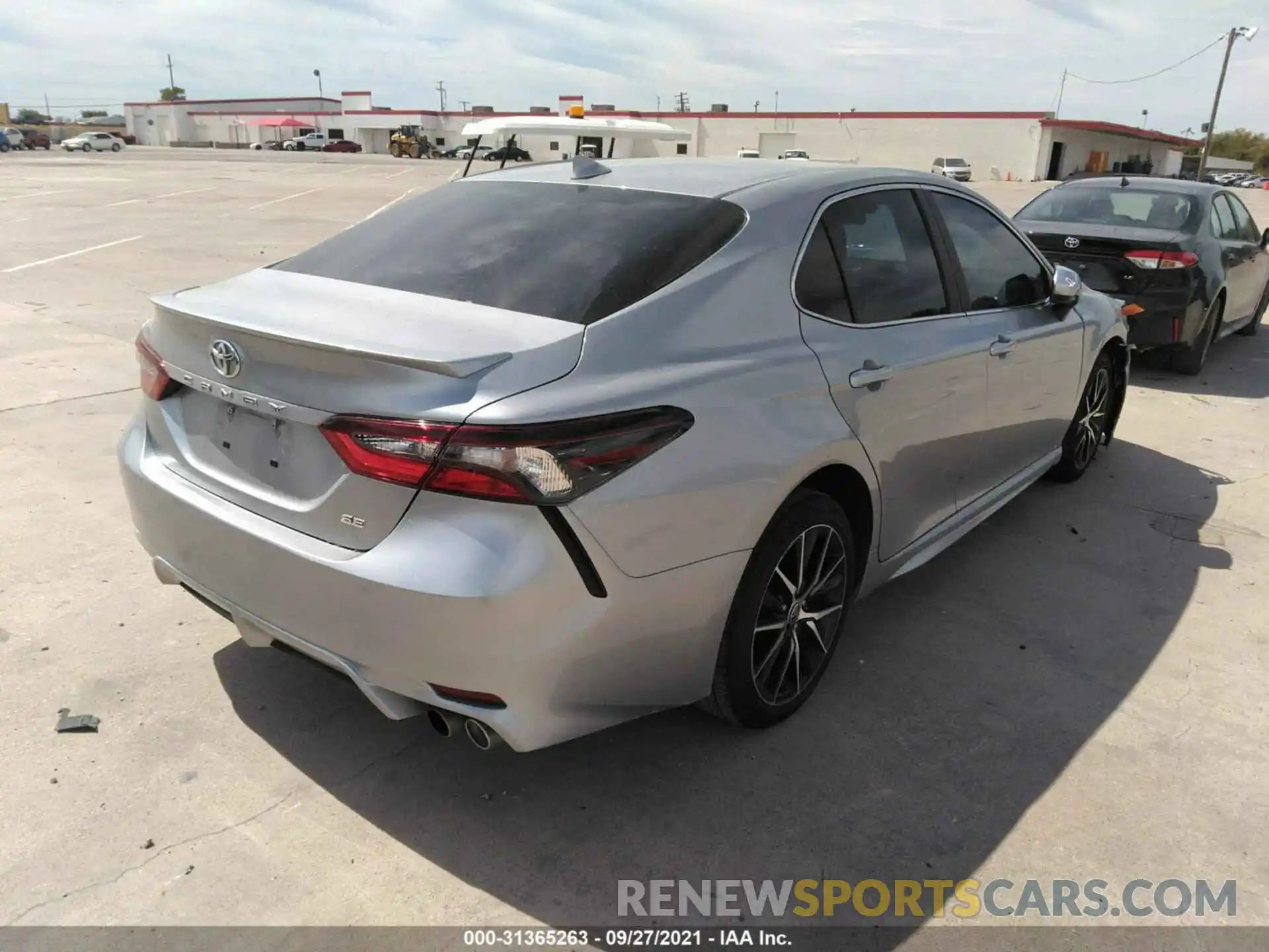 4 Photograph of a damaged car 4T1G11AK0MU522039 TOYOTA CAMRY 2021