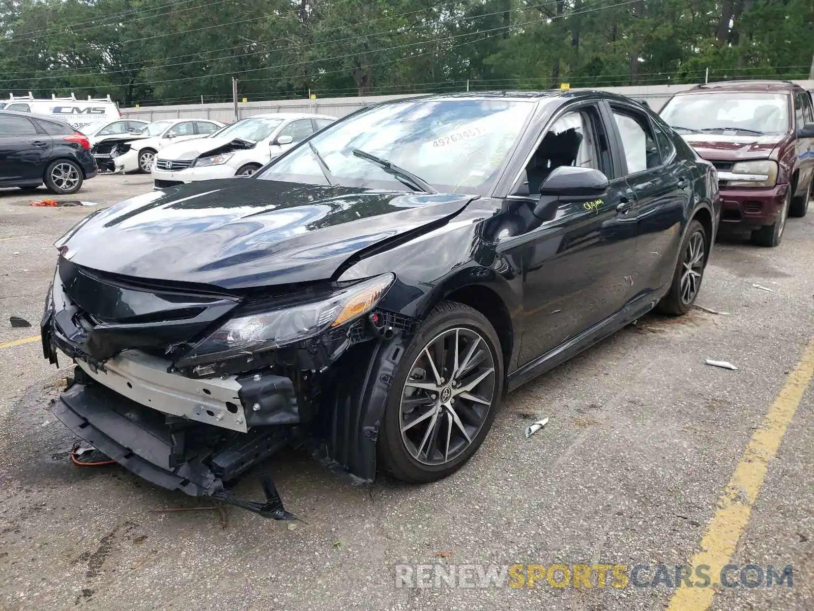 2 Photograph of a damaged car 4T1G11AK0MU525619 TOYOTA CAMRY 2021