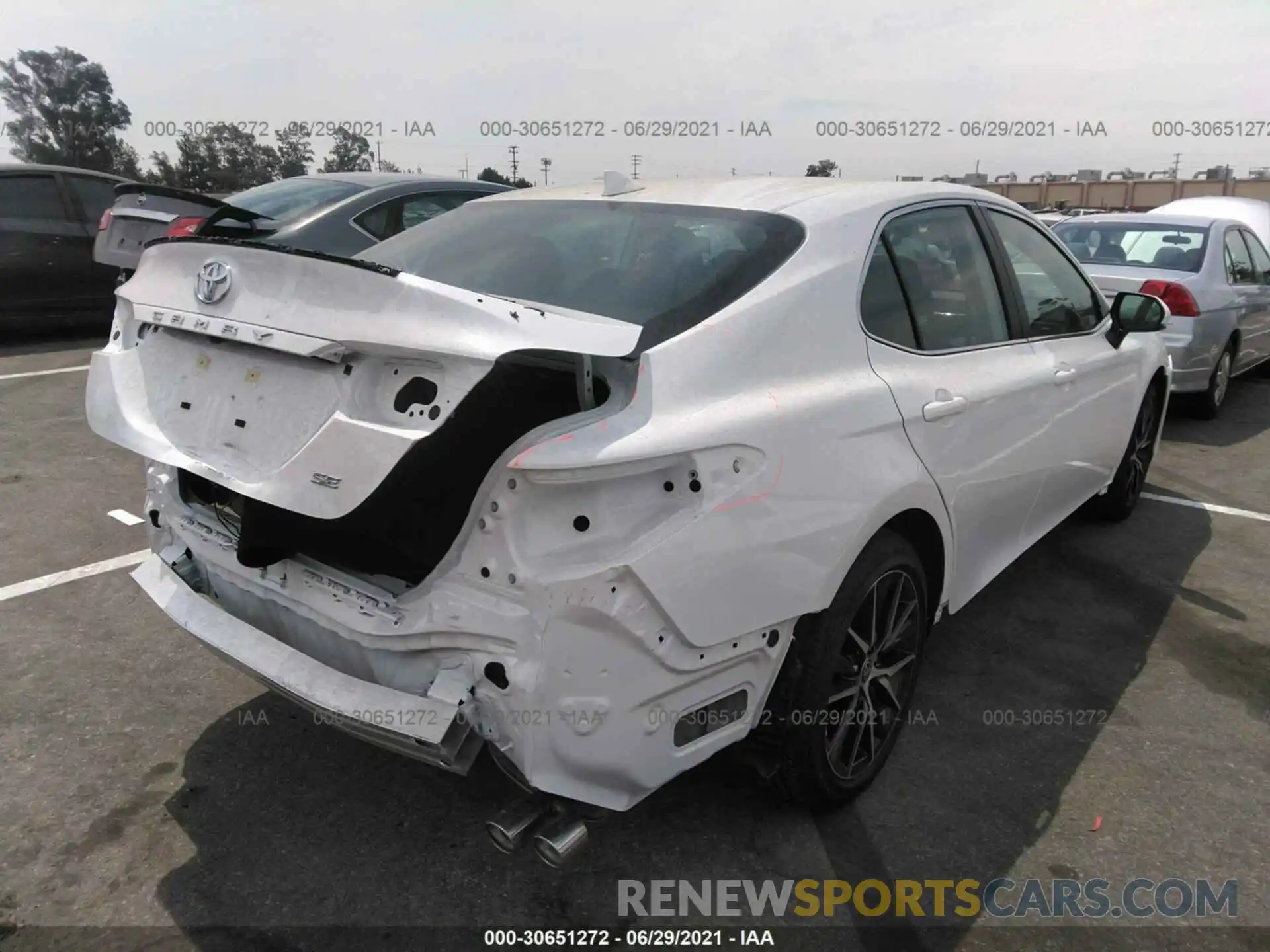 4 Photograph of a damaged car 4T1G11AK0MU582063 TOYOTA CAMRY 2021