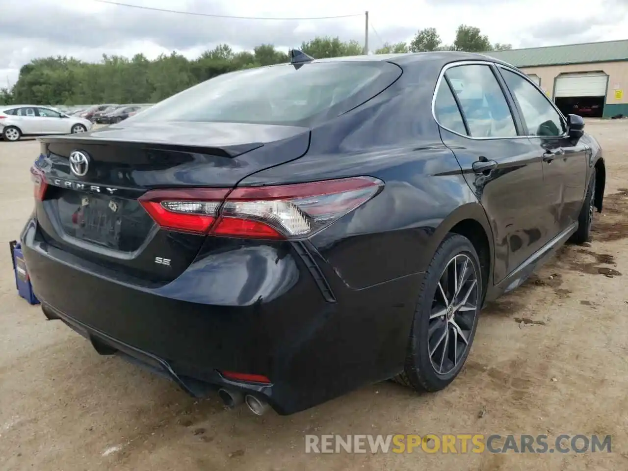 4 Photograph of a damaged car 4T1G11AK0MU599297 TOYOTA CAMRY 2021