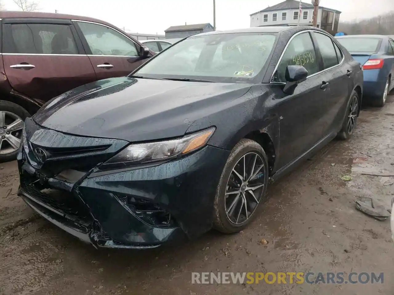 2 Photograph of a damaged car 4T1G11AK1MU410589 TOYOTA CAMRY 2021