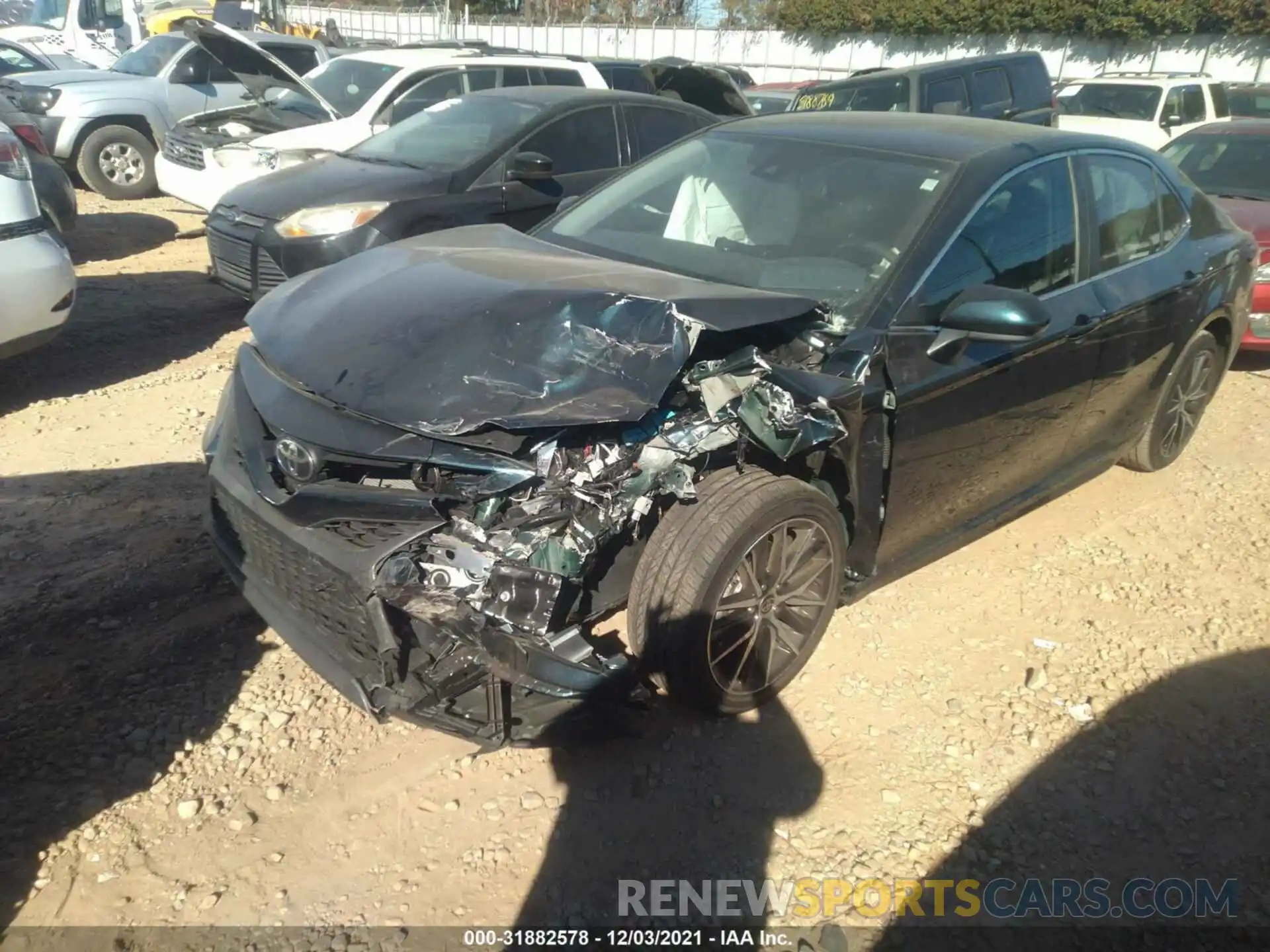 2 Photograph of a damaged car 4T1G11AK1MU413878 TOYOTA CAMRY 2021