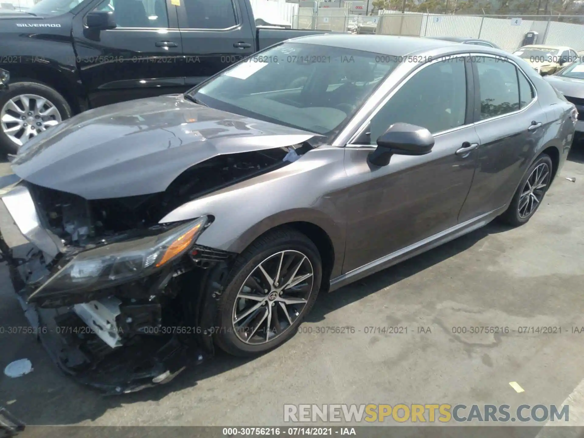 2 Photograph of a damaged car 4T1G11AK1MU434598 TOYOTA CAMRY 2021