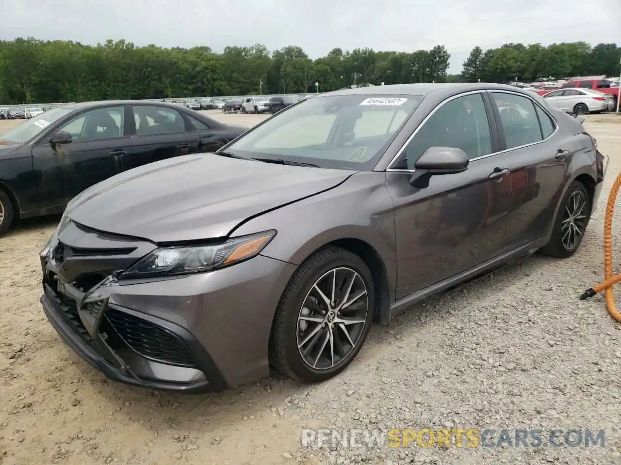 2 Photograph of a damaged car 4T1G11AK1MU439378 TOYOTA CAMRY 2021