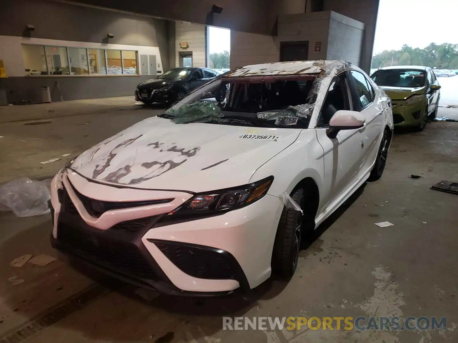 2 Photograph of a damaged car 4T1G11AK1MU523359 TOYOTA CAMRY 2021