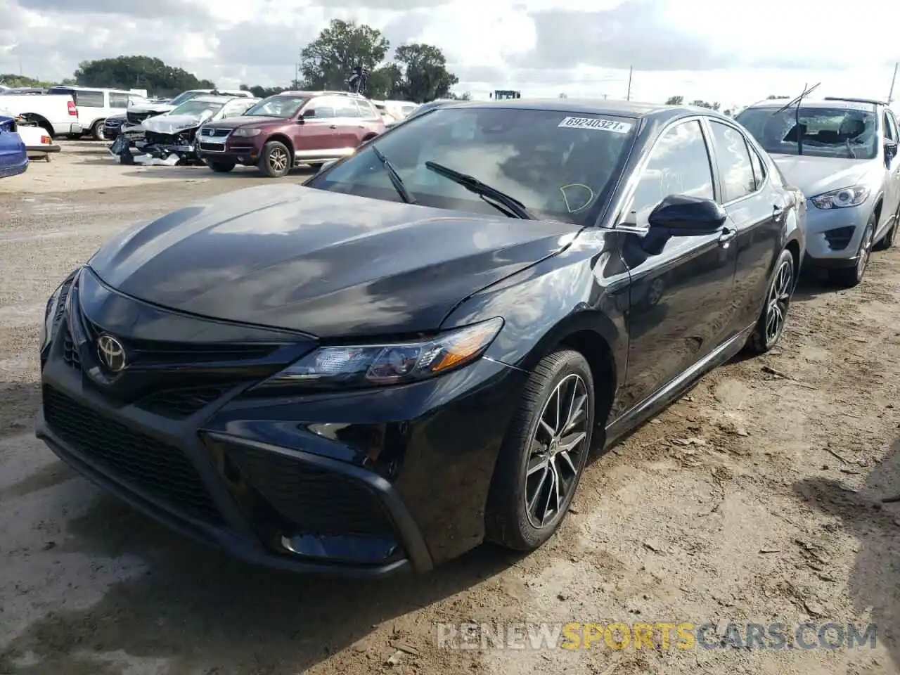 2 Photograph of a damaged car 4T1G11AK1MU561478 TOYOTA CAMRY 2021