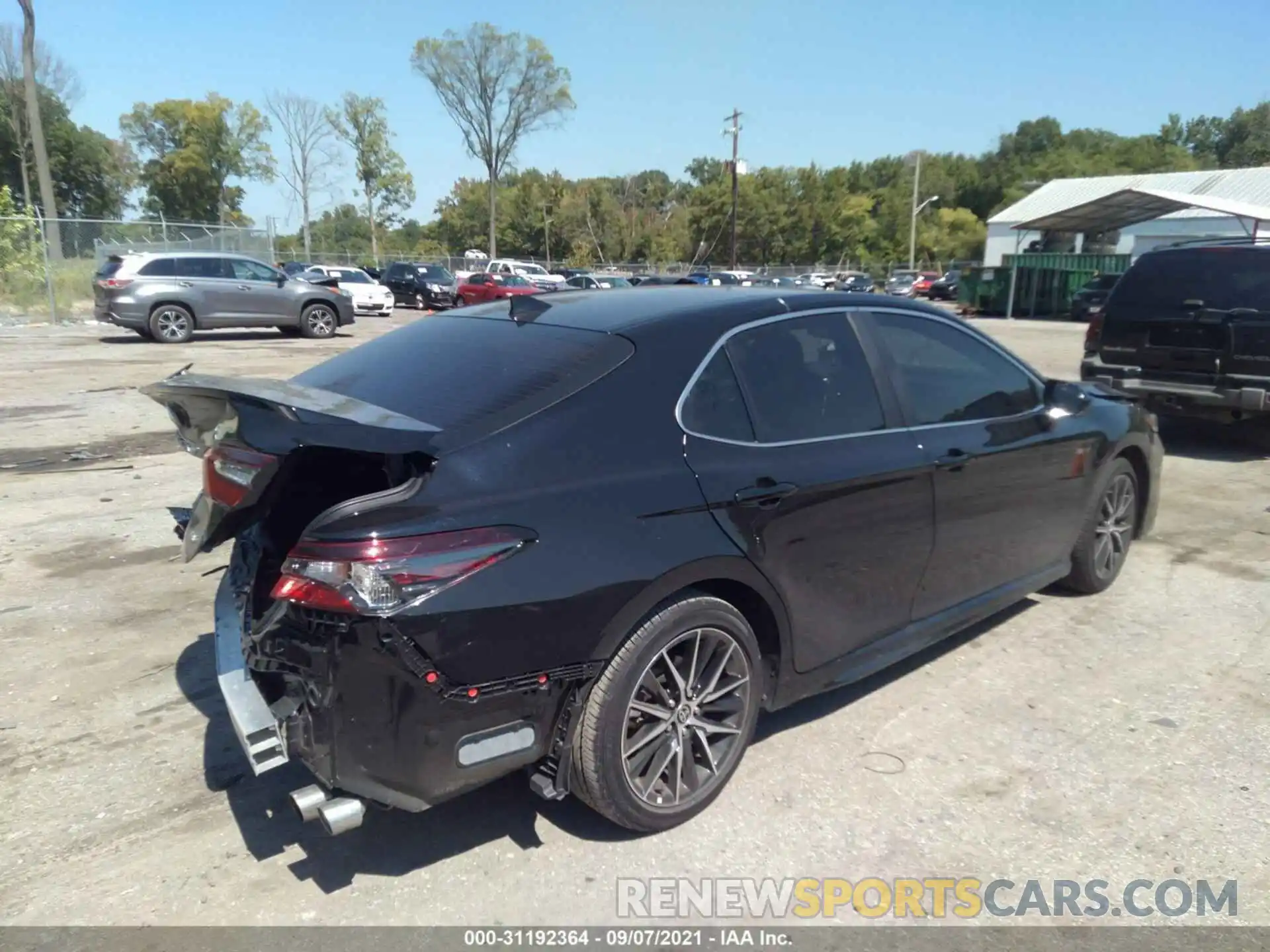 4 Photograph of a damaged car 4T1G11AK1MU569760 TOYOTA CAMRY 2021