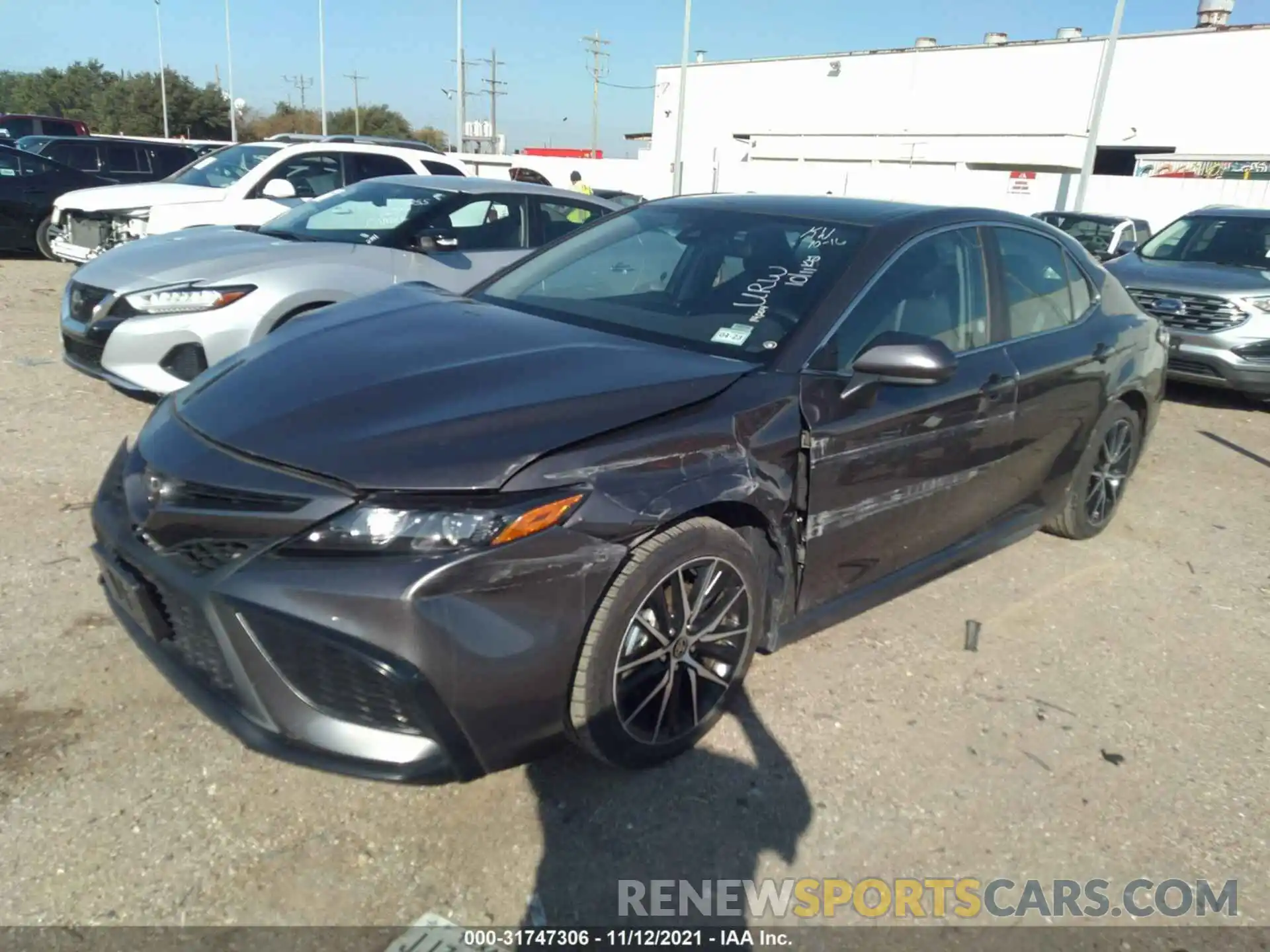 2 Photograph of a damaged car 4T1G11AK1MU573274 TOYOTA CAMRY 2021