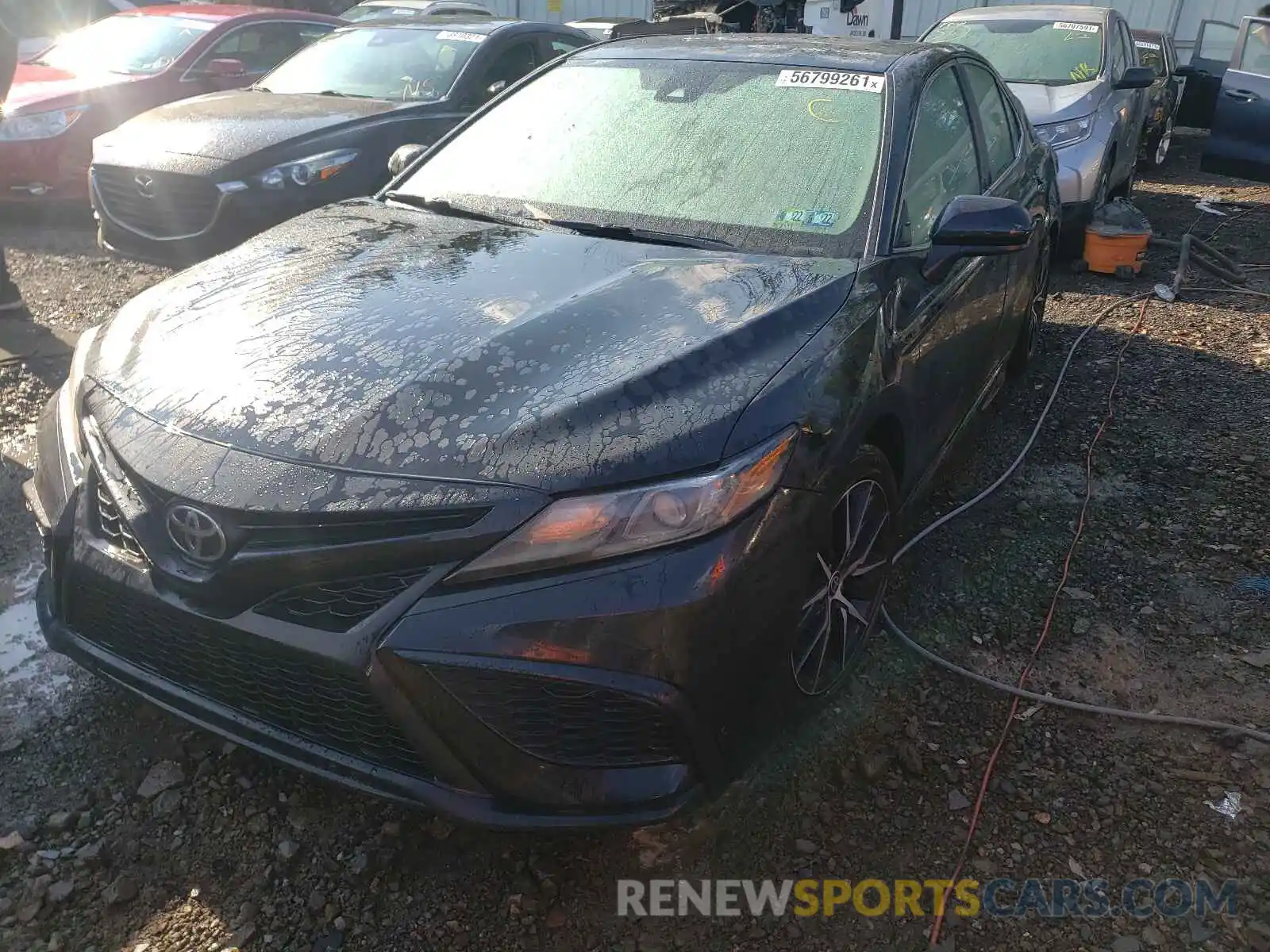 2 Photograph of a damaged car 4T1G11AK1MU583514 TOYOTA CAMRY 2021