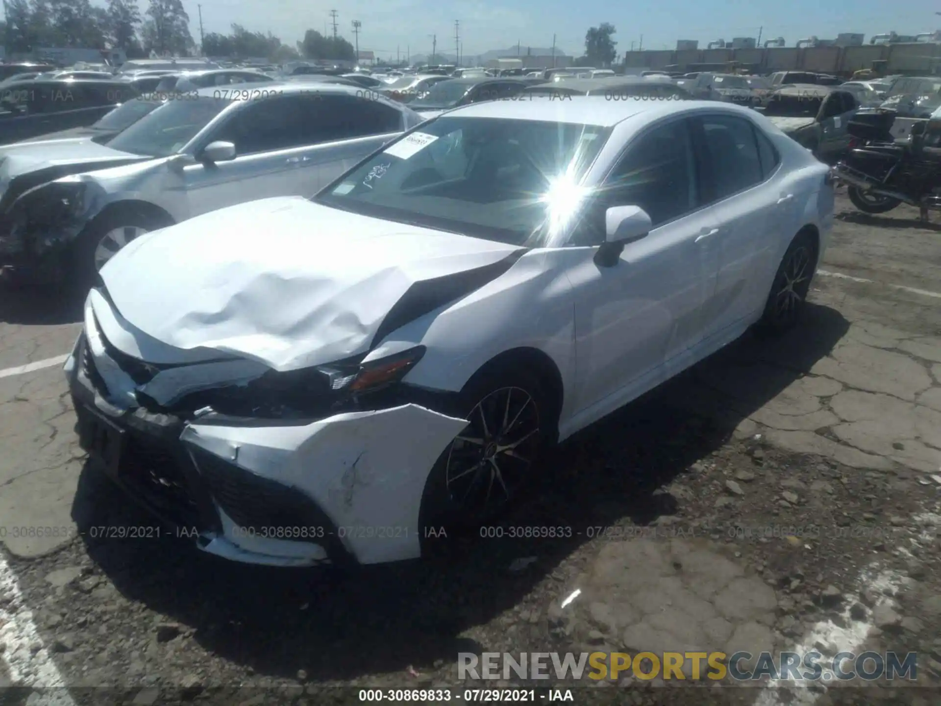 2 Photograph of a damaged car 4T1G11AK1MU594819 TOYOTA CAMRY 2021