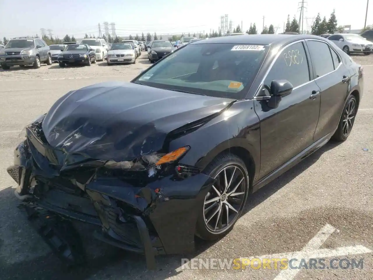 2 Photograph of a damaged car 4T1G11AK1MU608699 TOYOTA CAMRY 2021