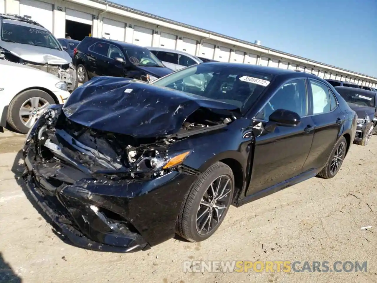 2 Photograph of a damaged car 4T1G11AK2MU474057 TOYOTA CAMRY 2021