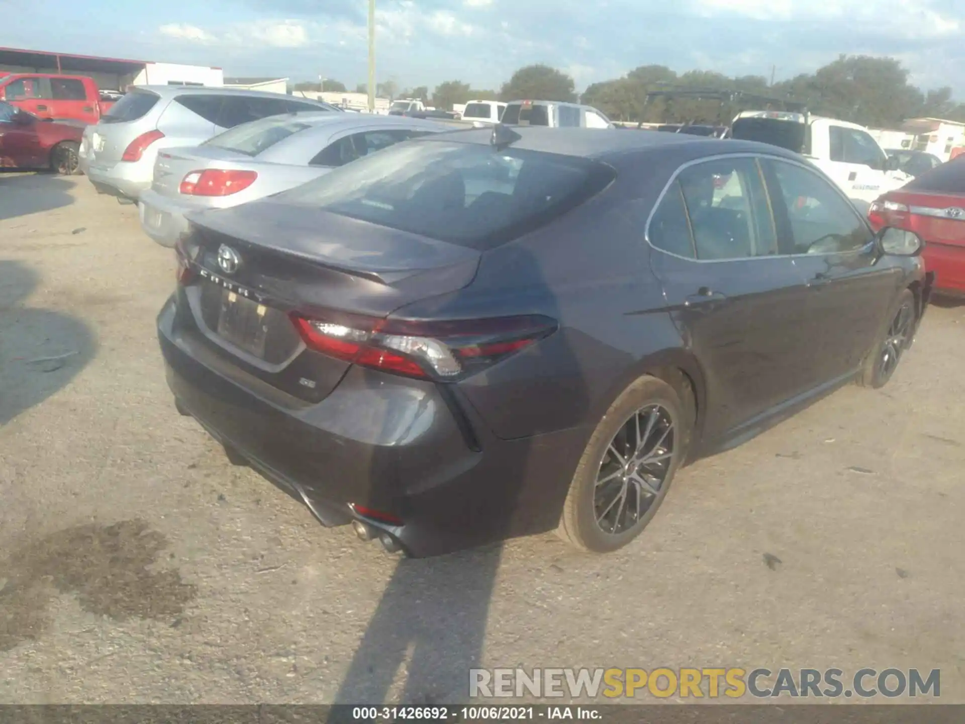 4 Photograph of a damaged car 4T1G11AK2MU475290 TOYOTA CAMRY 2021