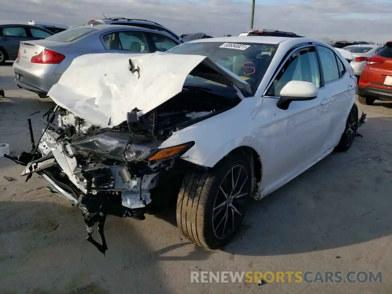 2 Photograph of a damaged car 4T1G11AK2MU518879 TOYOTA CAMRY 2021