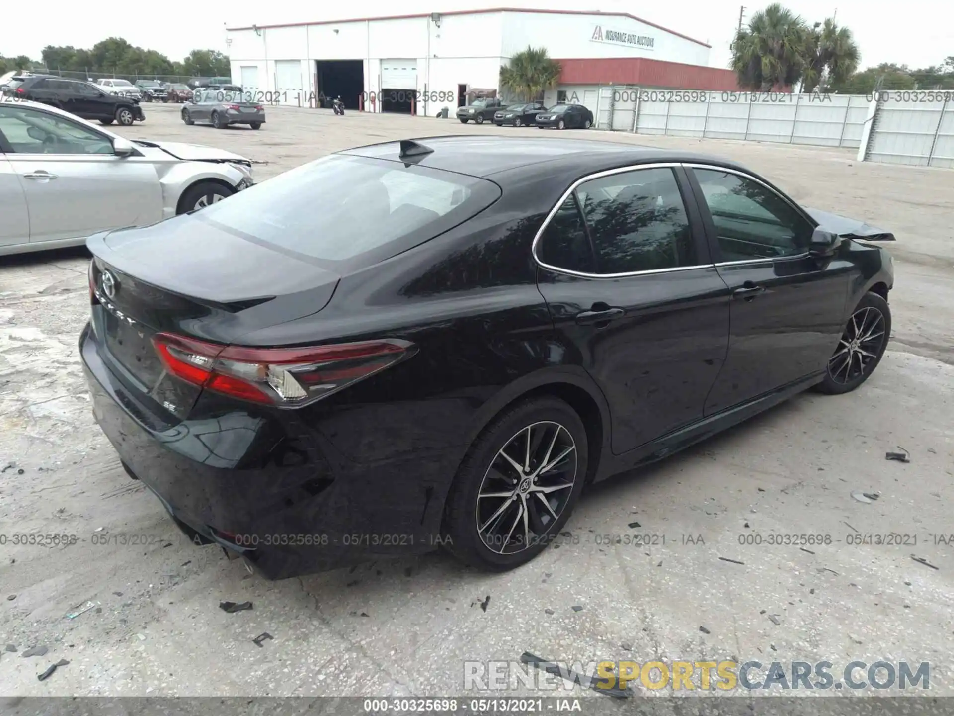 4 Photograph of a damaged car 4T1G11AK3MU410142 TOYOTA CAMRY 2021