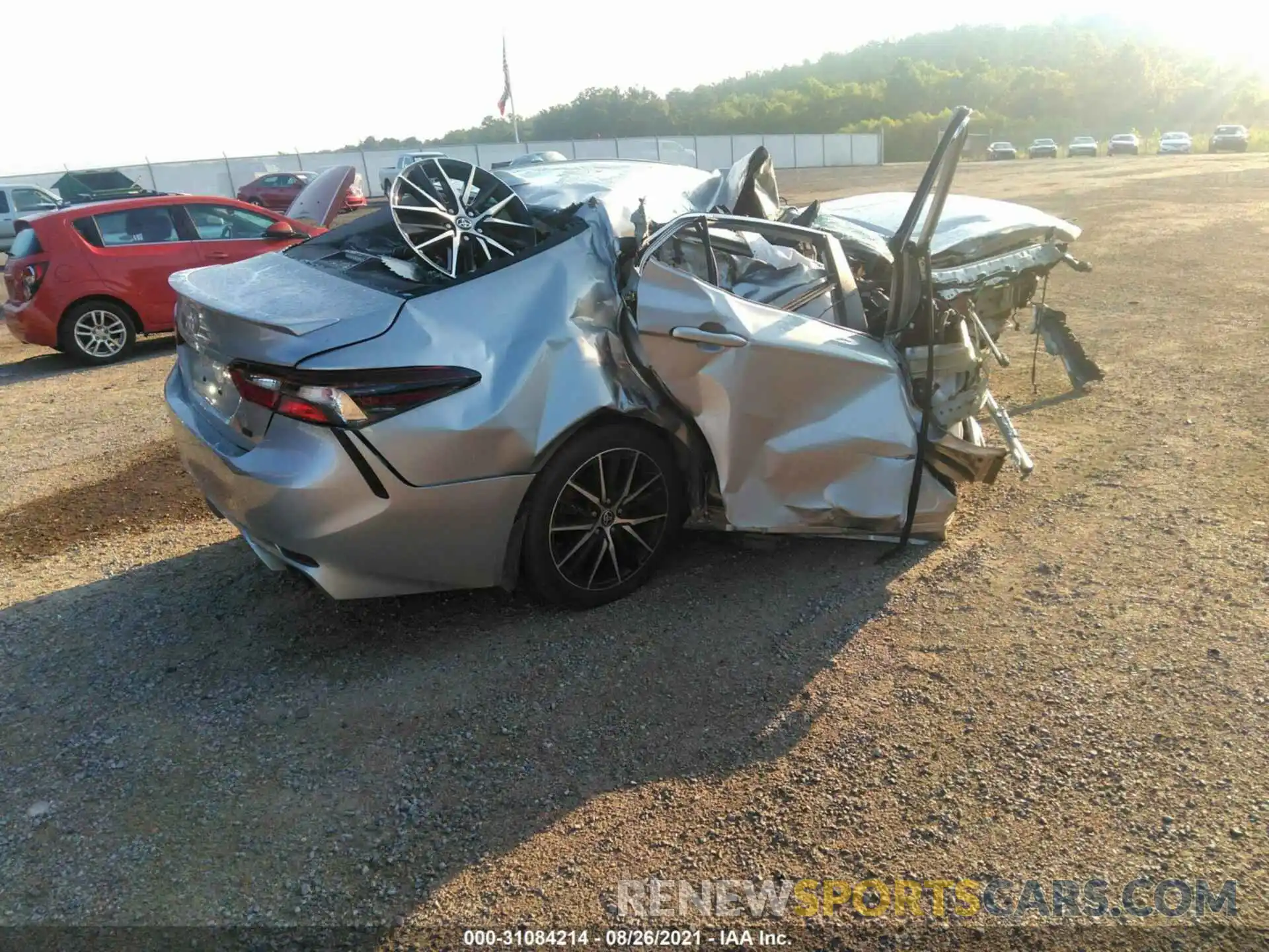 4 Photograph of a damaged car 4T1G11AK3MU422923 TOYOTA CAMRY 2021