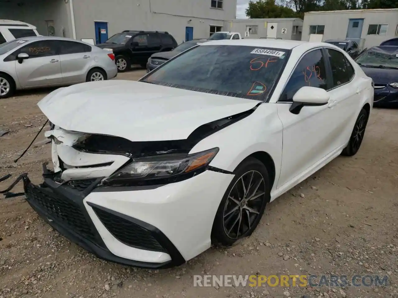 2 Photograph of a damaged car 4T1G11AK3MU560347 TOYOTA CAMRY 2021