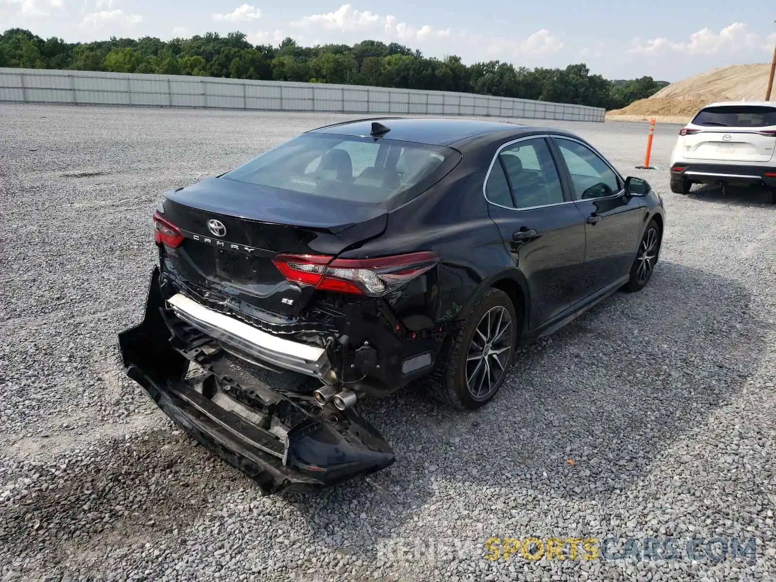 4 Photograph of a damaged car 4T1G11AK3MU592618 TOYOTA CAMRY 2021