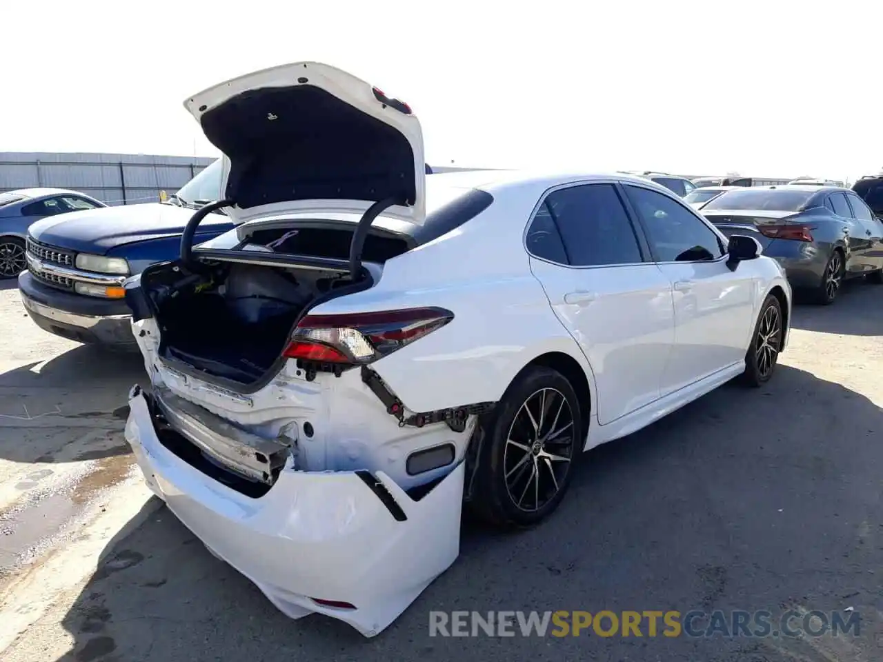 4 Photograph of a damaged car 4T1G11AK3MU599939 TOYOTA CAMRY 2021