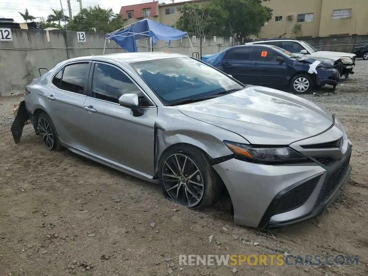 4 Photograph of a damaged car 4T1G11AK3MU612088 TOYOTA CAMRY 2021